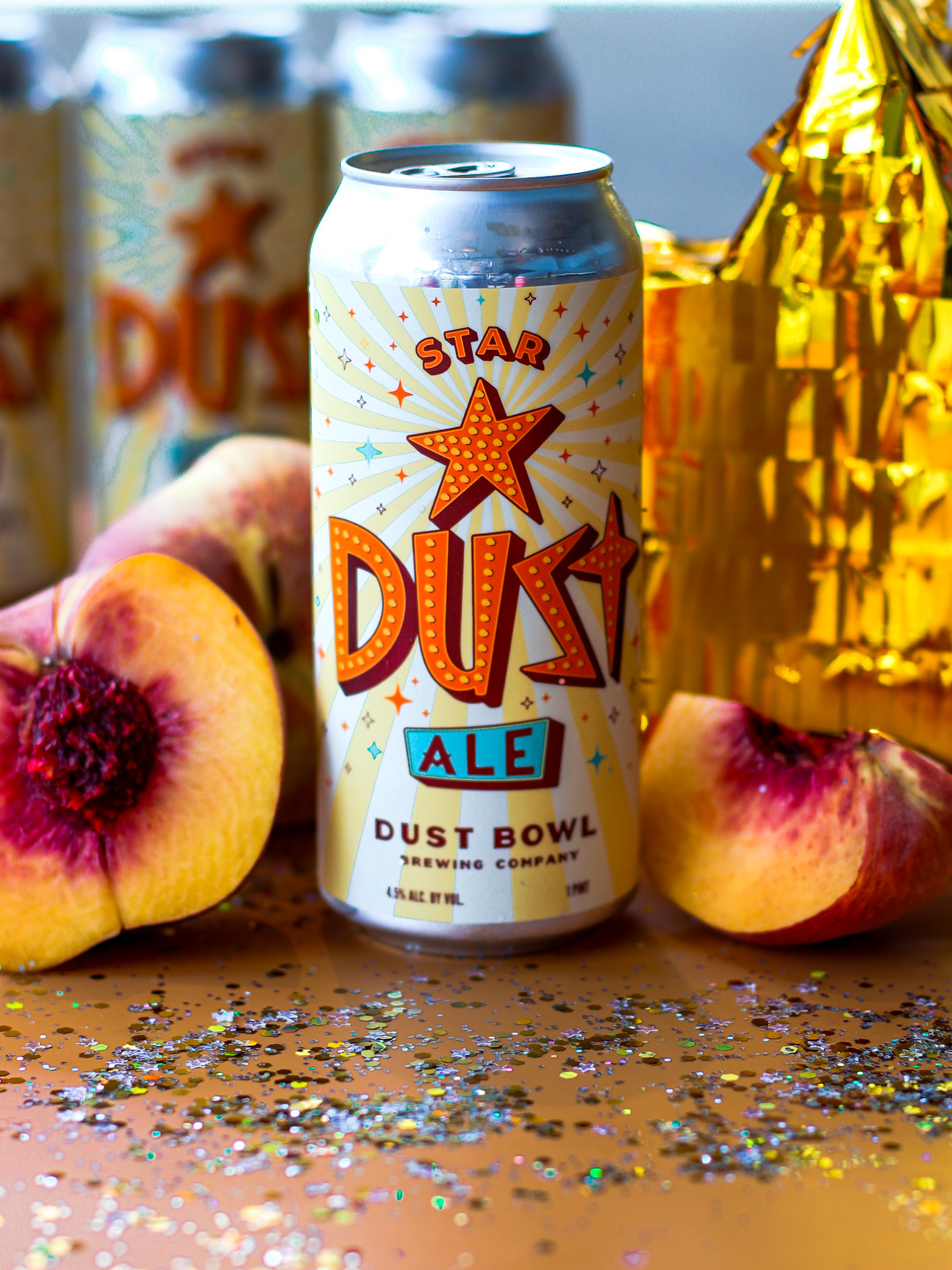 Picture of Star Dust Ale can with fresh peaches and confetti