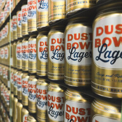 Lined up and stacked cans of Dust Bowl Lager