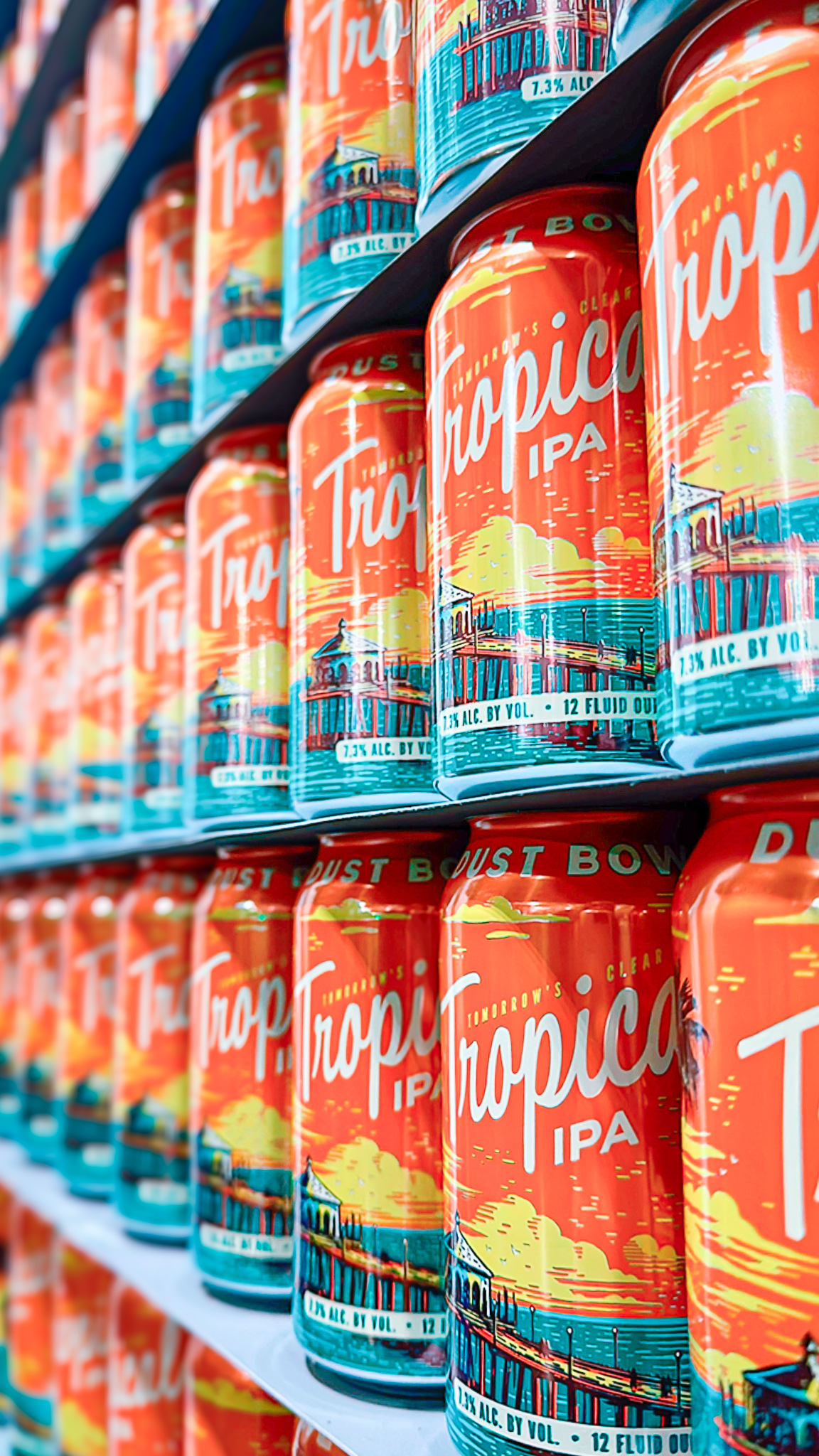 Stacked rows of Tomorrow's Clear Tropical IPA cans