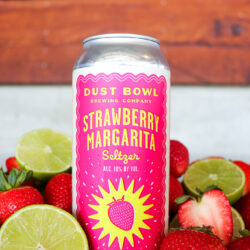 Strawberry Margarita Can with limes and strawberries