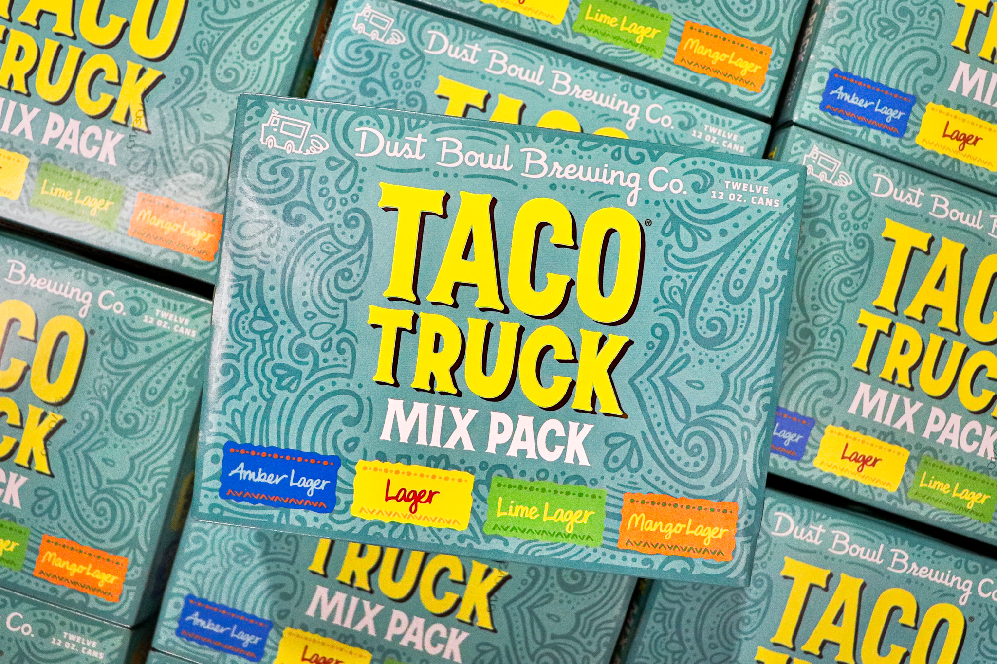 a lot of boxes of taco truck mix pack laying down