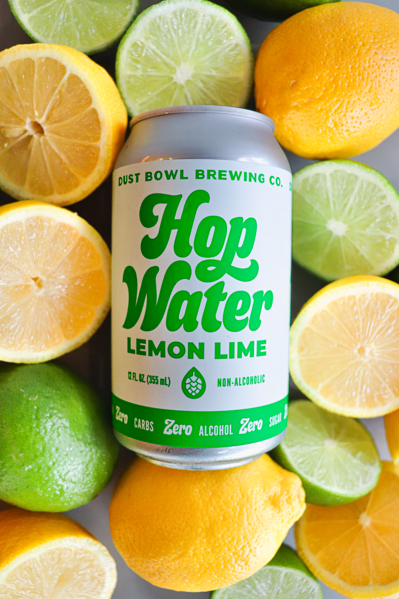 hop water can with sliced lemons & limes